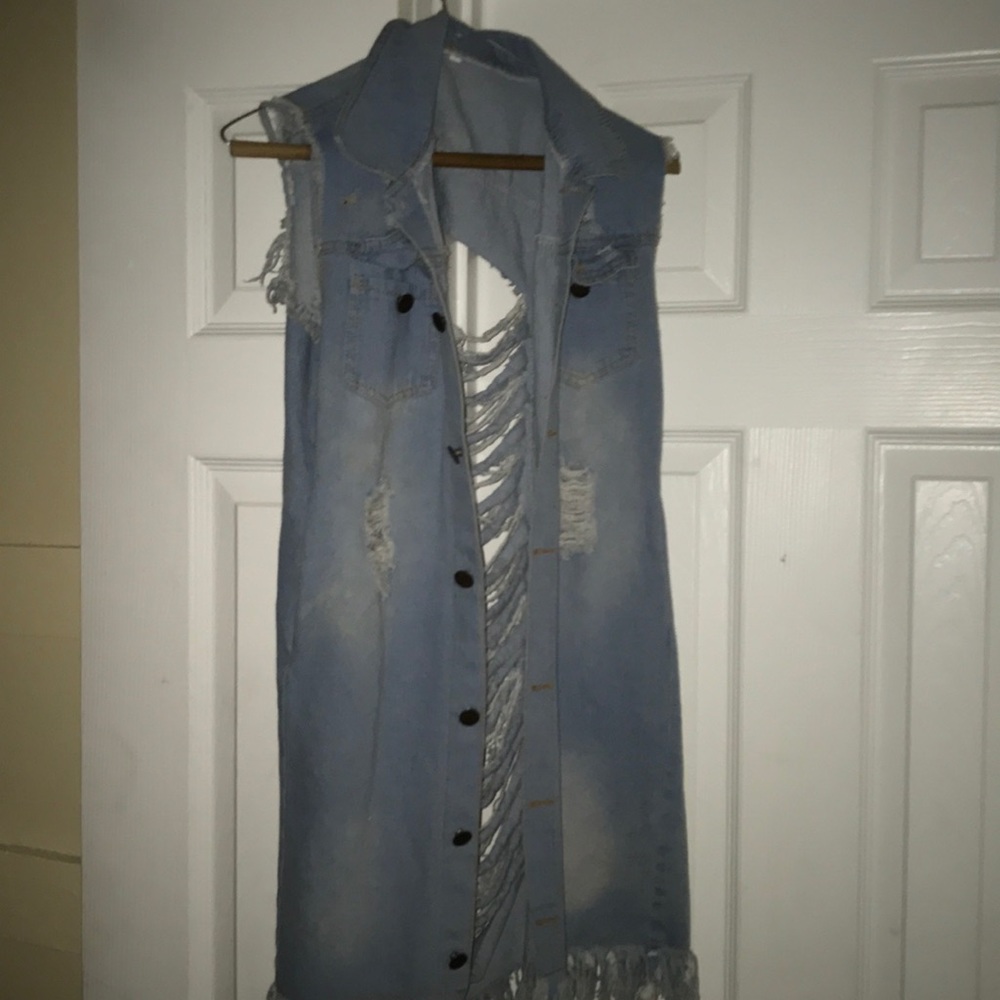 No sleeve jean jacket .